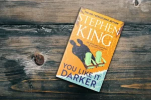 Stephen King You Like It Darker book cover photographed on wooden surface